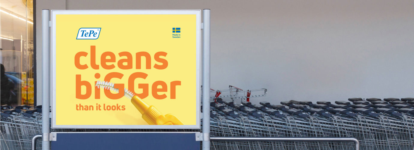 Photo of Tepe advertising poster in situ at Tesco store. Poster reads: Tepe, cleans bigger than it looks.