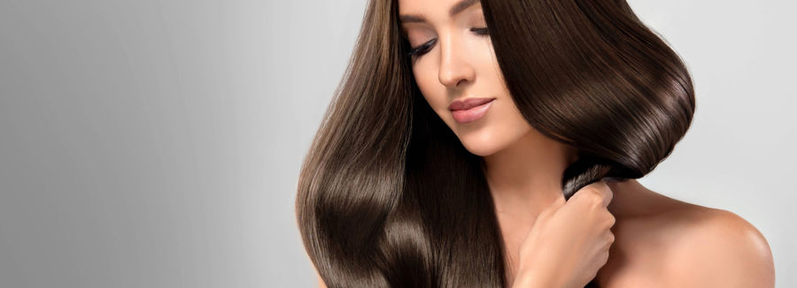 Woman with long sleek brown hair